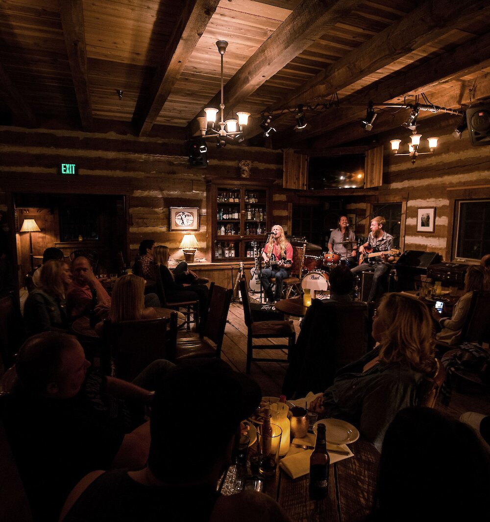 A musician playing at the Owl Bar