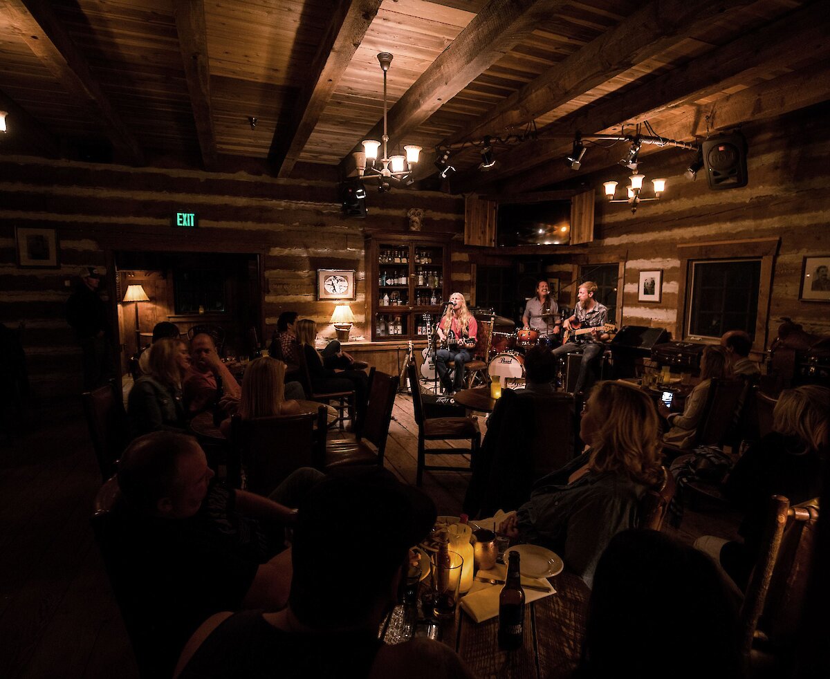 A musician playing at the Owl Bar