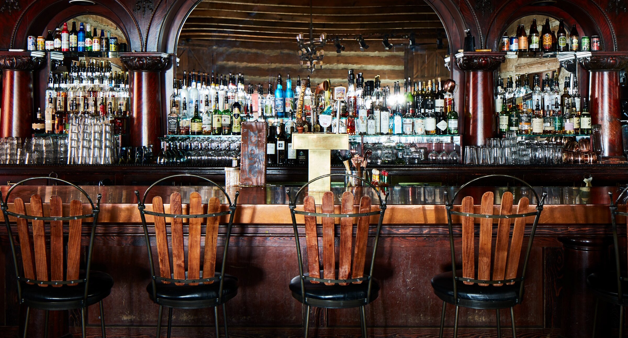 The bar and chairs at the Owl Bar.