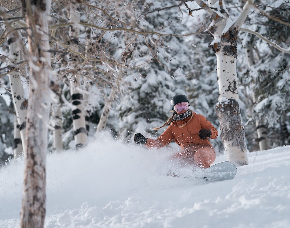 Snowboarding powder at Sundance Mountain Resort
