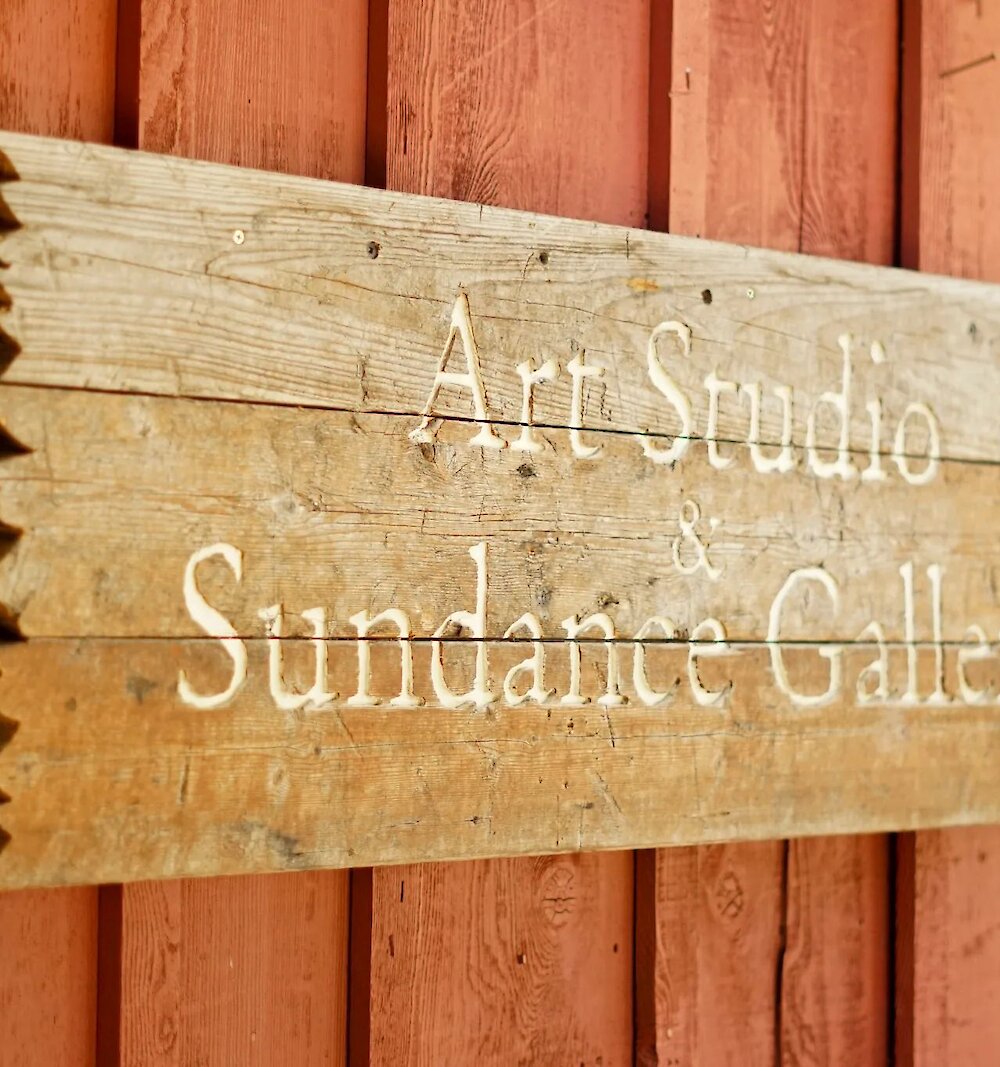 Art Studio and Gallery sign on wood.