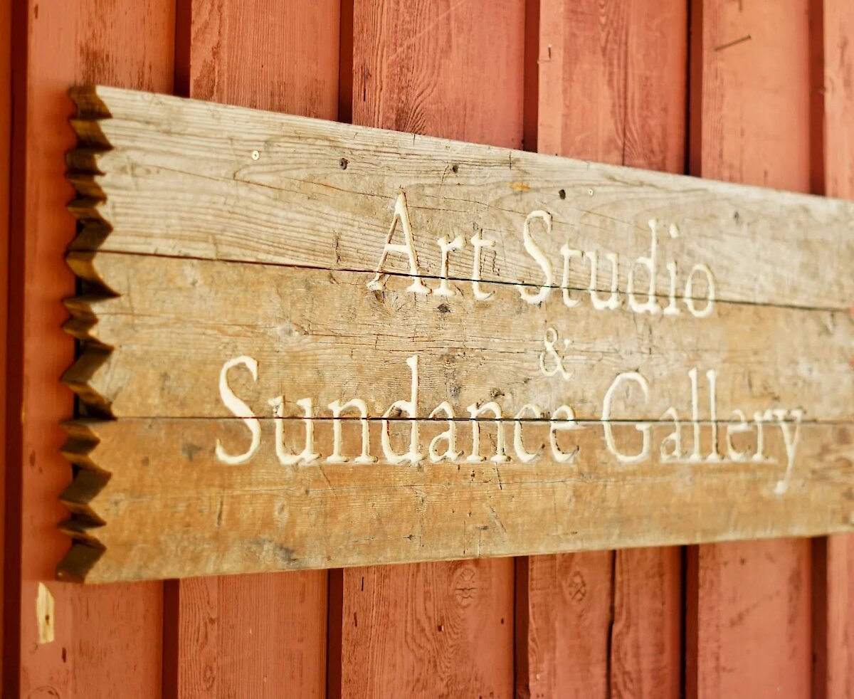 Art Studio and Gallery sign on wood.