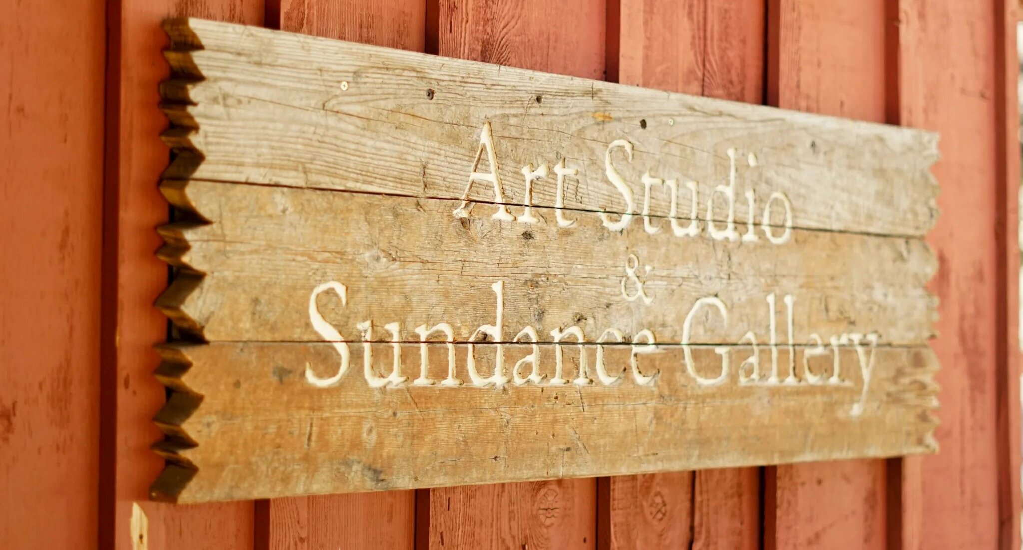 Art Studio and Gallery sign on wood.