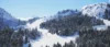 A picturesque winter landscape featuring snow-covered mountains with ski slopes, chairlifts, and sparse trees under a clear blue sky.