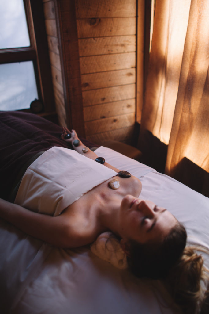 Woman enjoying a relaxing massage at the Sundance Spa.