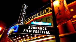 Brightly lit marquee of the Egyptian Theatre displaying 