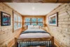 The Standard room is light and bright, surrounded with wood paneling.