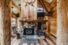 Rustic wood burning fireplace in the Sundance Suite.