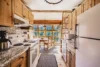 Lovely full-size kitchen with a gorgeous view of the mountains.