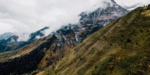 A vast mountain range with snowy peaks.