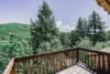 Gorgeous view of the green mountainside from the patio of Dream Catcher cabin.