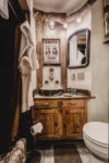 Splendid bathroom with vintage decor and an antique sink at Dream Catcher cabin.