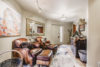 Ornate entryway with luxury chairs perfect for relaxing at Sunstone mountain home.