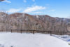 Backyard at Turkey Ridge vacation rental covered in beautiful white snow.