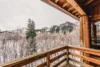 Gorgeous wood balcony with a stunning mountain view.