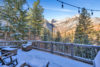Gorgeous deck area covered in snow at Cascade Ridge vacation rental.