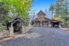 External view of Cascade Ridge home with a two-car garage and covered walkway.