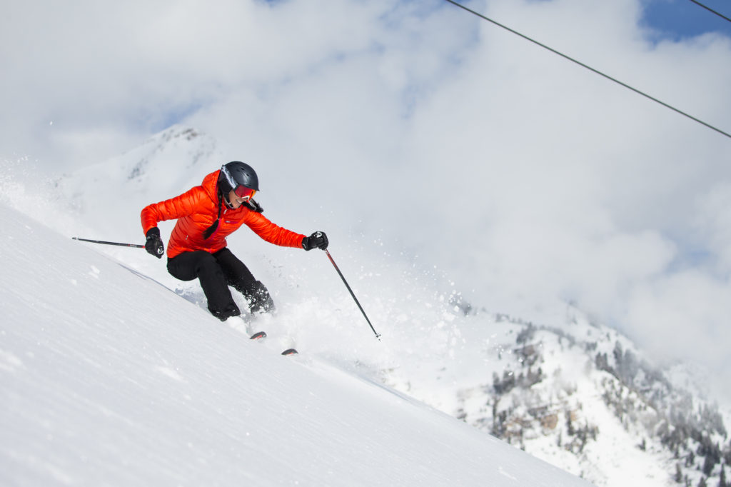 Woman skis down the mountain at Sundance Resort.