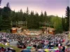 The Amphitheater at Sundance Resort is crowded with people watching a Sundance production.