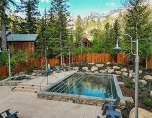 relaxation pool at sundance resorts the springs are with cottages, trees, and mountains in the background