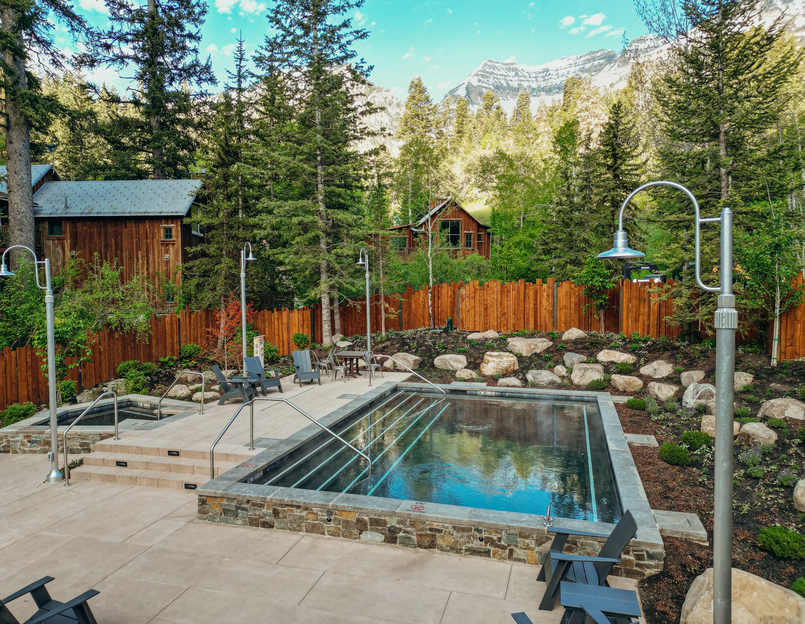 relaxation pool at sundance resorts the springs are with cottages, trees, and mountains in the background